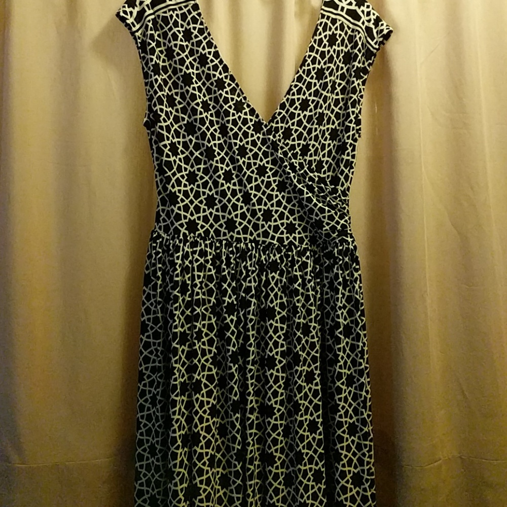 Black and white  sleeveless dress .